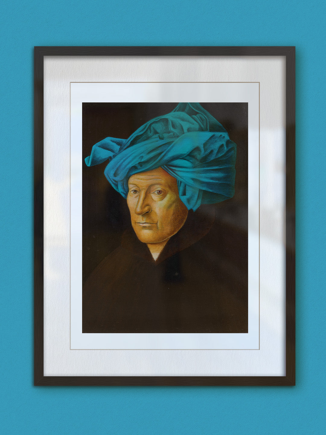 giza with a red, yellow and blue towel on his head