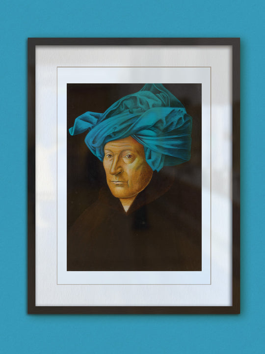 giza with a red, yellow and blue towel on his head